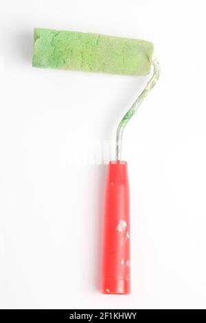 Paint roller in front of a white background Stock Photo