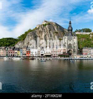 View of the small town of Dinant with Maas river and citadel and cathedral in the old town