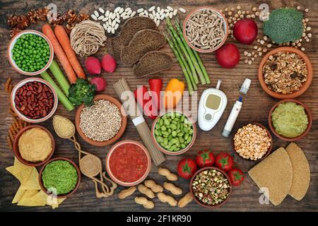 Low glycemic vegan diet food for diabetics below 55 on the GI index with testing  & lancing devices. High in antioxidants, anthocyanins, vitamins, min Stock Photo