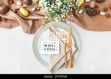Beautiful table setting for Easter celebration Stock Photo