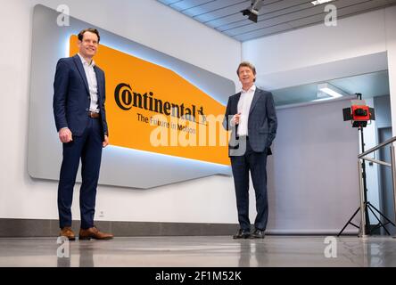 09 March 2021, Lower Saxony, Hanover: Nikolai Setzer (l), Chairman of the Executive Board of Continental AG, and Wolfgang Schäfer, member of the Executive Board of Continental AG, stand during a photo opportunity at the company's headquarters. The Corona fallout and expensive corporate restructuring have kept Continental, the second-largest automotive supplier, in the red again in 2020. Photo: Julian Stratenschulte/dpa Stock Photo