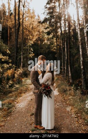 Happy bride and groom looking at each other Stock Photo