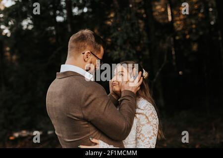 Bride and groom looking at each other Stock Photo
