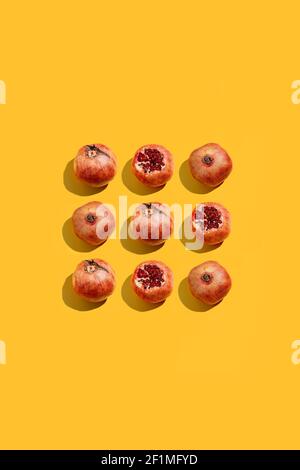 Minimal nature pattern with pomegranate. Summer fruit concept Stock Photo