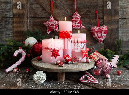 Pink candles and festive decorations Stock Photo