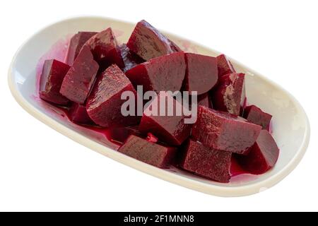 Pickled beetroot appetizer (mezze) isolated on a white background. Healthy vegan food. Local name pancar turşusu Stock Photo