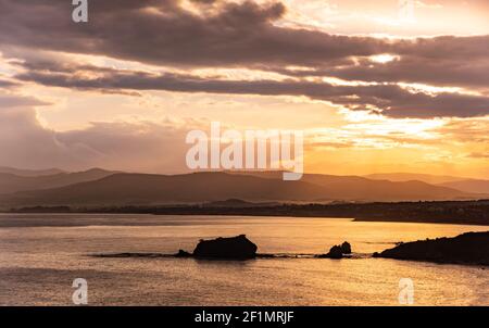 Beautiful sunset, Akamas, Cyprus. Tourist resort with sand beaches and warm sea. Stock Photo