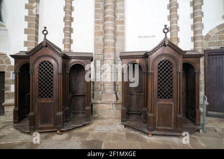 View of the confessional in the Abbey Sainte-Croix in Quimperle in Brittany Stock Photo