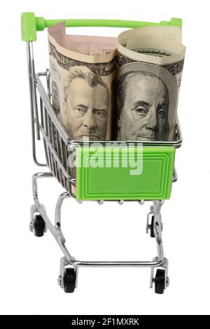 There is a dollar in a metal grocery basket.Shopping cart with dollar bill, note isolated on white background Stock Photo