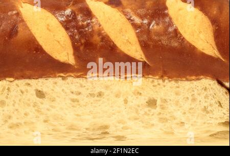 Flat texture of chopped french loaf with gashes. Stock Photo