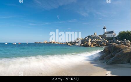 Pontusval lighthouse and coast in northern Brittany Stock Photo