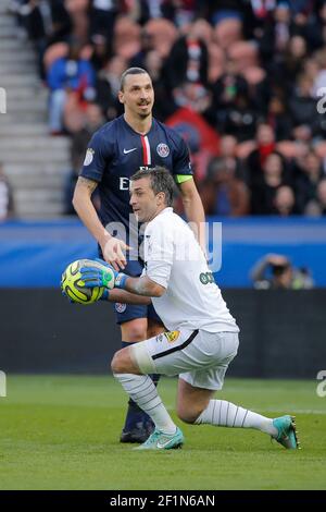 Zlatan Ibrahimovic (psg), Rudy RIOU (RC Lens) during the French Championship Ligue 1 football match between Paris Saint Germain and RC Lens on March 7, 2015 at Parc des Princes stadium in Paris, France. Photo Stephane Allaman / DPPI Stock Photo