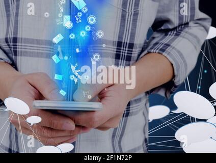 Network of speech bubble icons and digital icons over mid section of person using smartphone Stock Photo