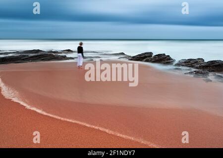 A person at the beach. Zinkwazi Beach, South Africa Stock Photo