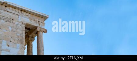 Historical marble parts and Hellenistic, Greek columns from the Parthenon Acropolis in Athens, Greece. Panoramic view with large copy space. Stock Photo