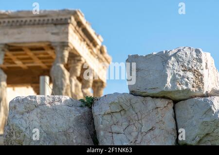 Historical marble parts and Hellenistic, Greek columns from the Parthenon Acropolis in Athens, Greece. Panoramic view with large copy space. Stock Photo