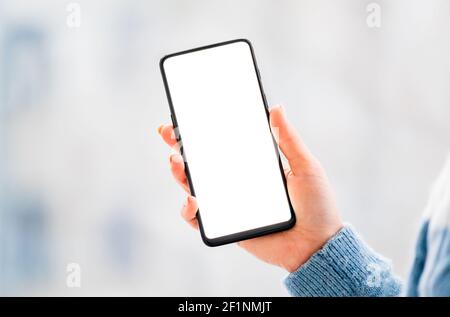 Hands working on mobile phone close up Stock Photo
