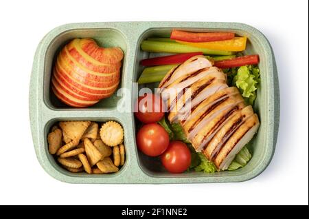 Lunch box with delicious food on a white background Stock Photo