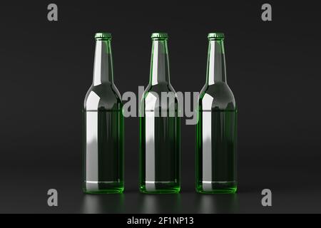 Three beer bottles 500ml mock up on black background. Front view Stock Photo