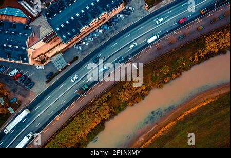 Aerial view of asphalted road going along river in Sighisoara
