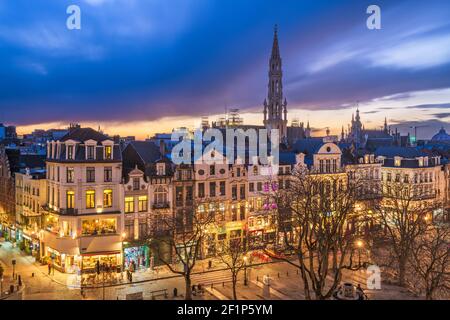 Brussels, Belgium plaza and skyline with the Town Hall tower at dusk. Stock Photo