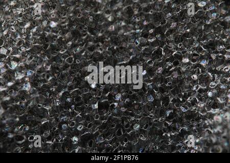 Background texture of black airtight foam rubber Stock Photo