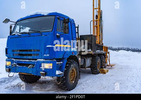 truck with drilling rig. Performing water well drilling and geological engineering surveys Stock Photo