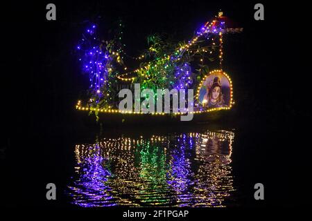 reflection of decorative lights in water Stock Photo