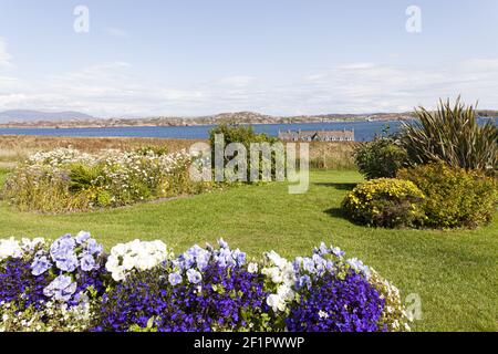 A view from Baile Mor on Iona, off the Isle of Mull, Inner Hebrides, Argyll and Bute, Scotland, UK - looking over the Sound of Iona to the Isle of Mul Stock Photo