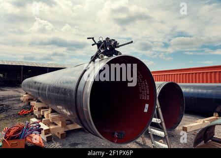 Bulgaria, Trapishte, MAY 7th, 2020: Cutting pipe on site in a construction base during the construction process of South stream pipeline Stock Photo