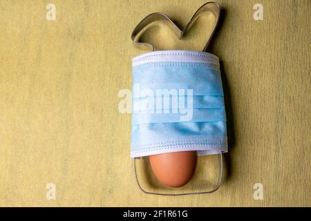 Easter bunny baking pan for cookie cutter with mask and egg Stock Photo