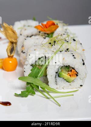 Close up of vegan sushi roll. Isolated image