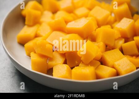 Chunks of slow cooked butternut squash Stock Photo