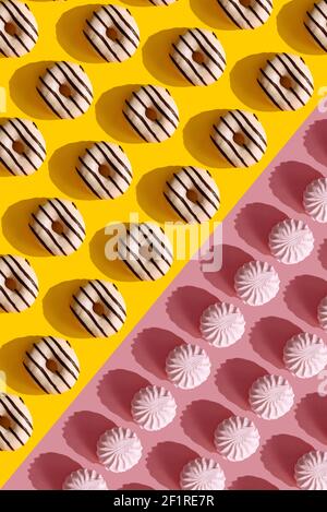 a pattern on a yellow background of donuts Stock Photo