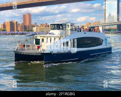 Waterway Boat at Lower Manhattan, next to Brooklyn Bridge, New York. Stock Photo