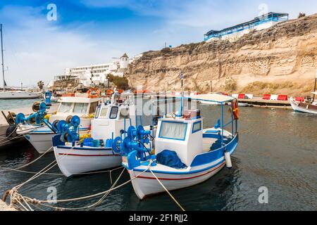 Fishing boats on the island of Santorini in the Cyclades in Greece Stock Photo