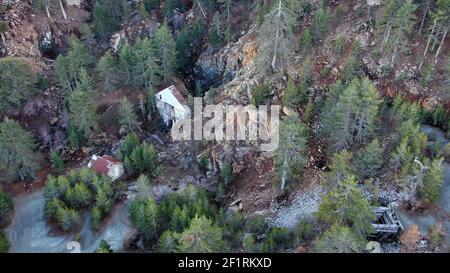 Aerial view of old mine structures. Kokkinorotsos abandoned chromite mine in Troodos mountains, Cyprus Stock Photo