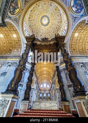 The 17th century Baldacchino by Gian Lorenzo Bernini in Saint Peter Basilica - Vatican State in Rome Stock Photo