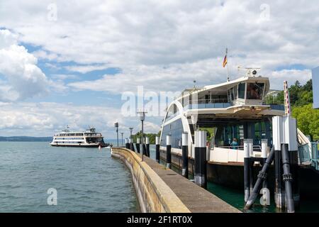 The car and passenger departing from Meersburg harbor towards Konstanz in southern Germany Stock Photo