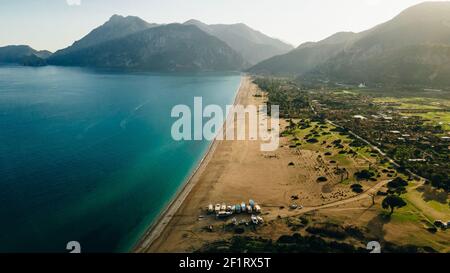 CHIRALI, TURKEY: aerial view Sunny beach resort in Turkey with stunning views of the mountains Stock Photo