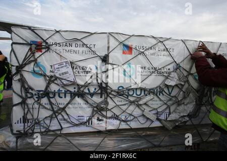 Containers with the vaccines seen during a ceremony to mark the arrival of 30,000 doses of the Sputnik V vaccine shipment at Tunis-Carthage International Airport. Stock Photo
