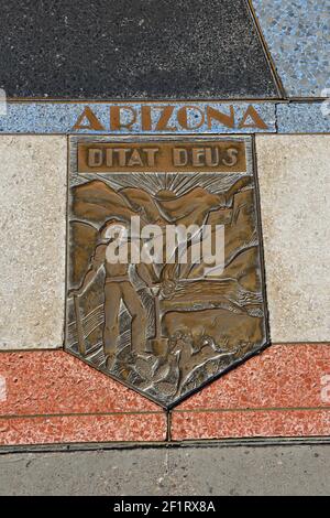 Bas relief plaque for New Arizona is inlaid into Hoover Dams plaza's surface, one of the seven states that fall within the Colorado River's basin. Hoo Stock Photo