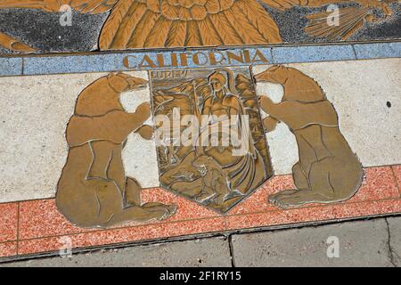 Bas relief plaque for California is inlaid into Hoover Dams plaza's surface, one of the seven states that fall within the Colorado River's basin. Hoov Stock Photo