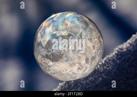 Bubbles, created in winter by the photographer, rapidly form ice crystals on the inside surfaces, Michigan, USA, Stock Photo
