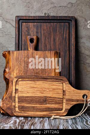 Cutting board on wooden kitchen table Stock Photo