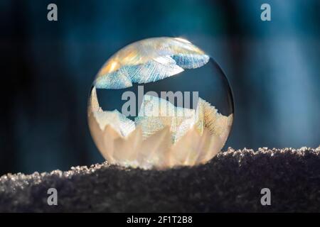 Bubbles, created in winter by the photographer, rapidly form ice crystals on the inside surfaces, Michigan, USA, Stock Photo