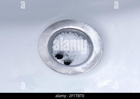 Drain Pipe Cleaner. Sink Pipe Cleaner. Close up view. Cleaning concept. Drainage Pipe Cleaner Disinfect and Deodorant. Stock Photo