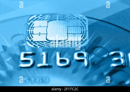 Credit cards. Blue toned. Business. E-commerce concept. Shallow depth of field. Selective focus. Macro shot. Stock Photo