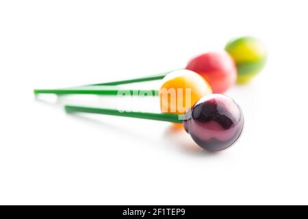 Sweet fruity lollipops isolated on white background. Stock Photo