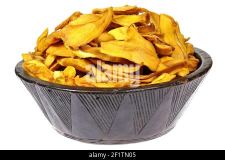dried organic mango in a wooden bowl isolated on white background Stock Photo